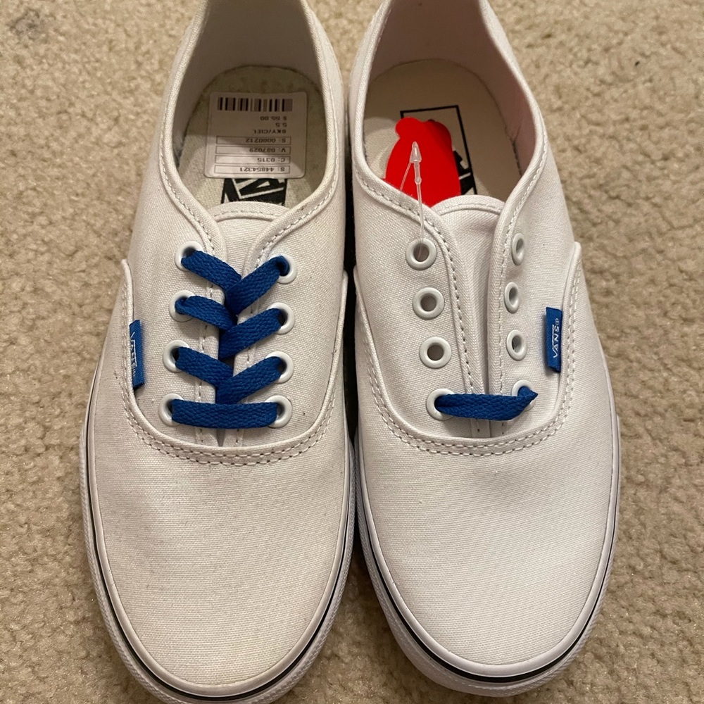 Vans White and Blue colored with writing on sides